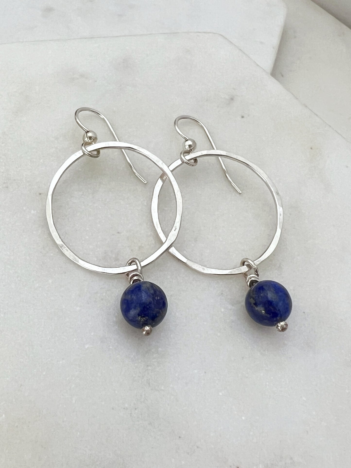 Sterling silver hoop earrings with lapis gemstones