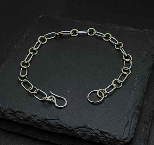 Forged sterling silver and 14k gold chain bracelet