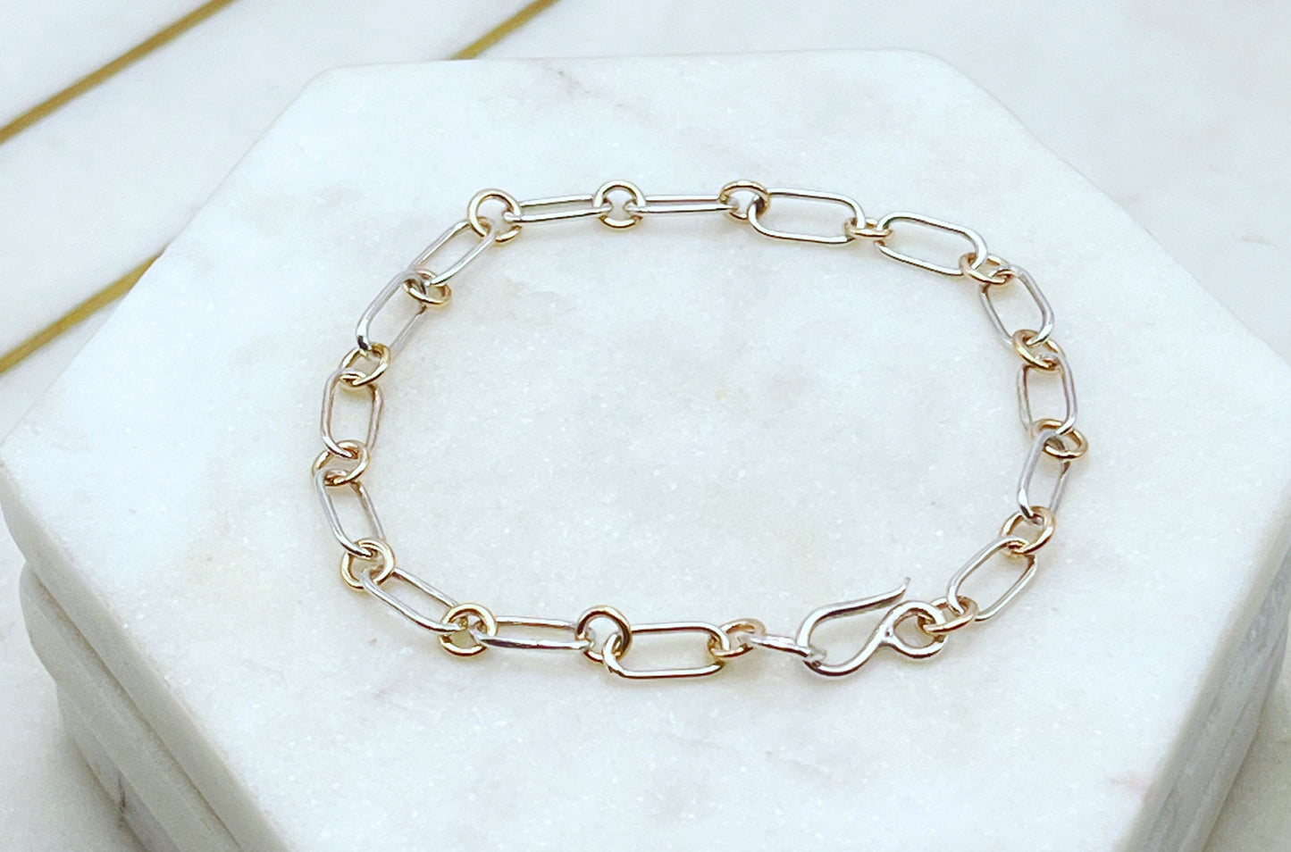 Forged sterling silver and 14k gold chain bracelet