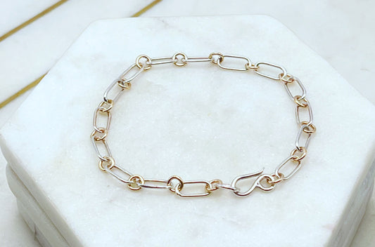 Forged sterling silver and 14k gold chain bracelet