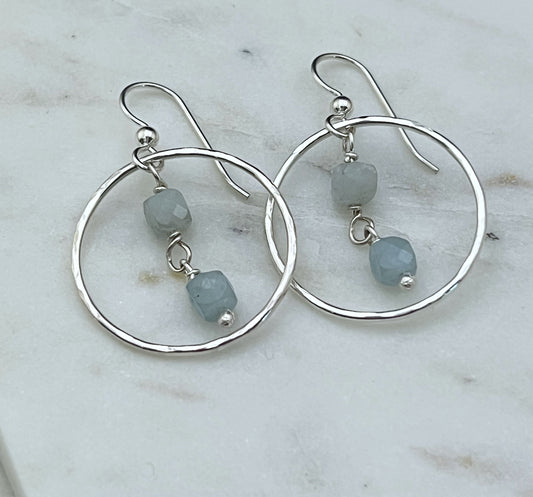 Sterling silver hoop earrings with aquamarine gemstones