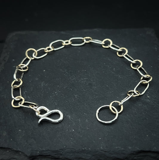 Forged sterling silver and 14k gold chain bracelet