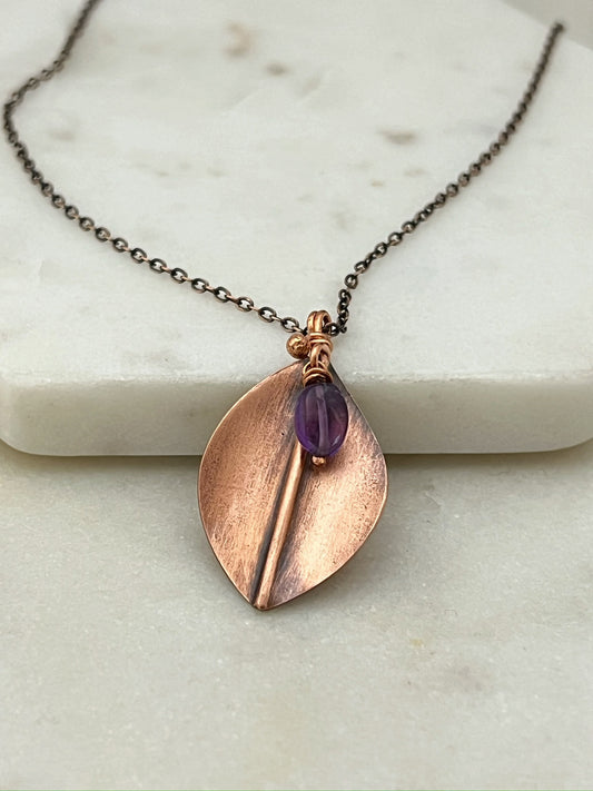 Hand forged copper leaf necklace with amethyst gemstone