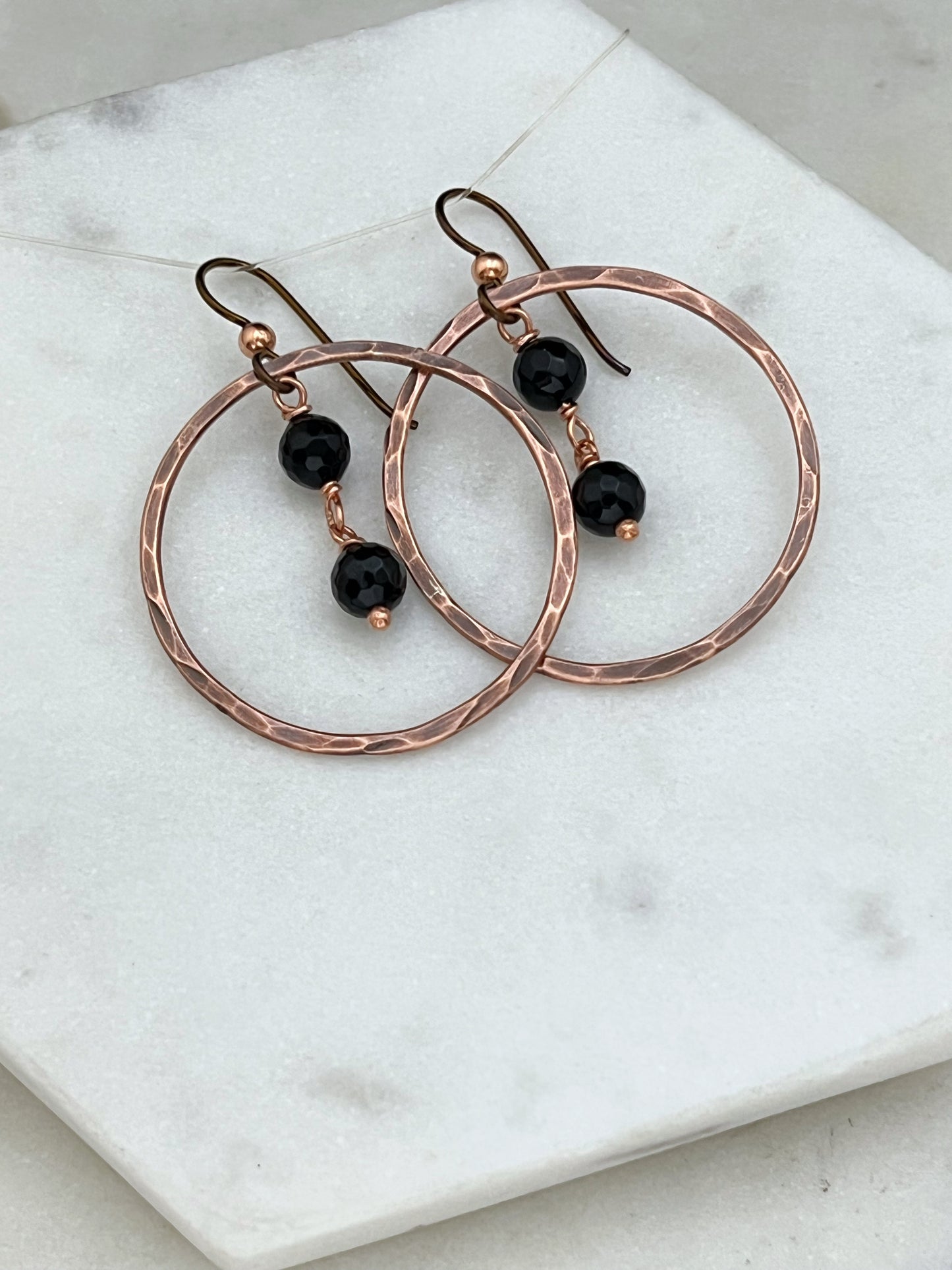 Copper hoops with onyx gemstones