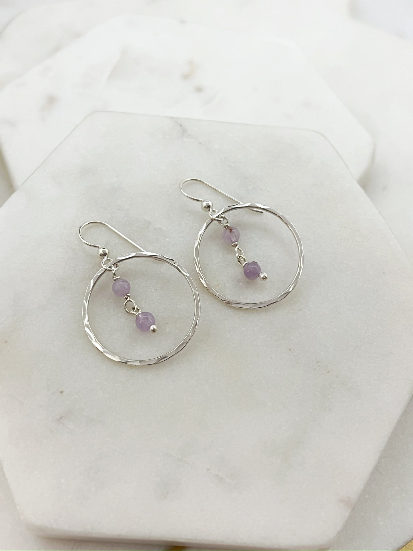 Sterling silver hoop earrings with amethyst gemstones