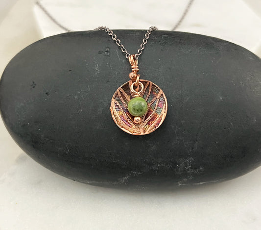 Acid etched copper dish necklace with a jade gemstone