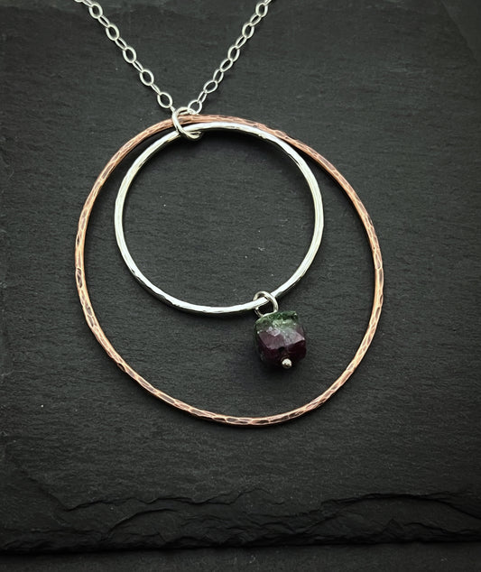 Sterling silver and copper forged hoop necklace with ruby zosite