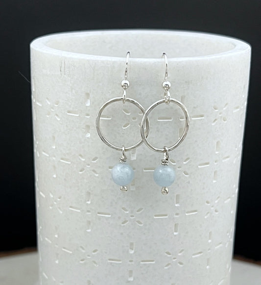 Sterling silver hoop earrings with aquamarine gemstones