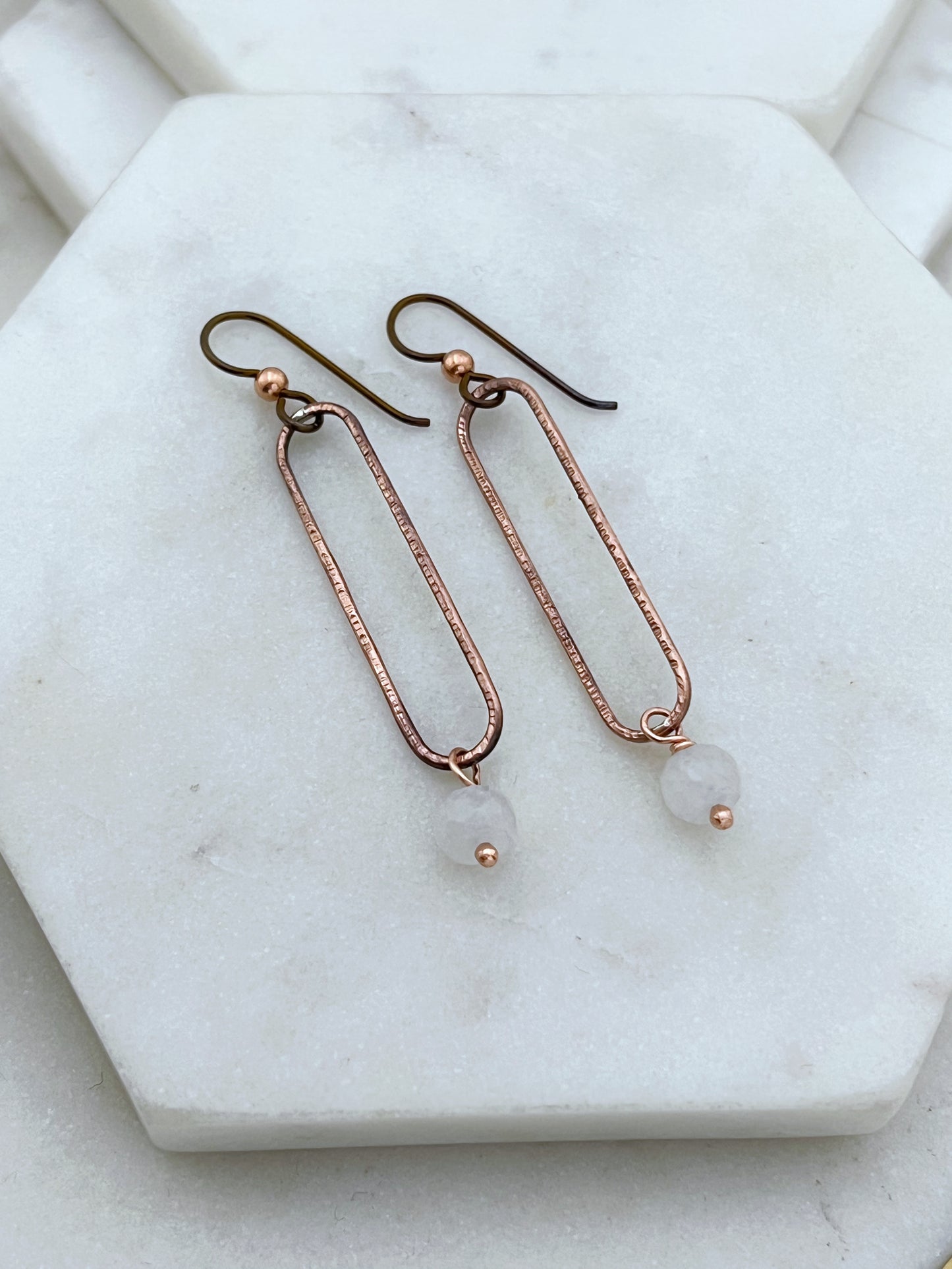 Copper oval hoops with moonstone gemstones