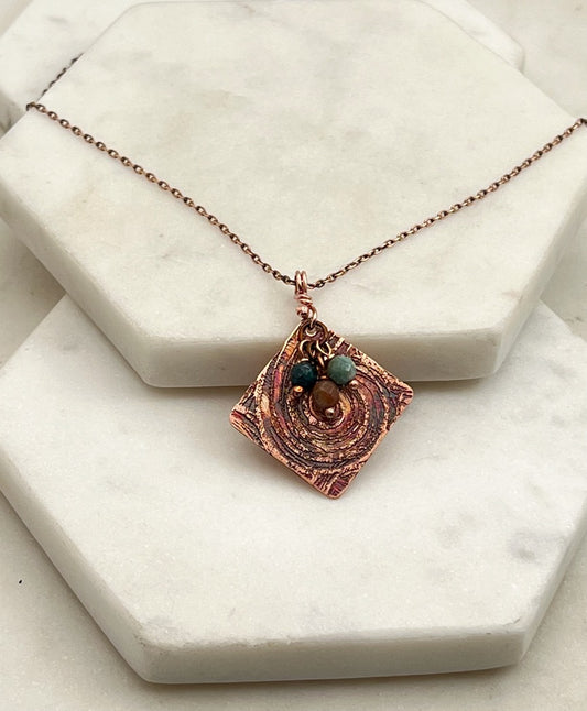 Acid etched copper necklace with moss agate gemstones