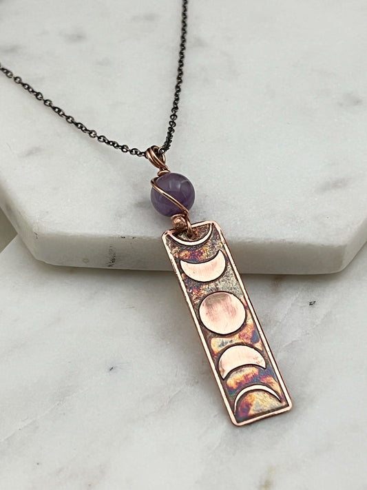 Moon phase acid etched copper necklace with amethyst gemstone