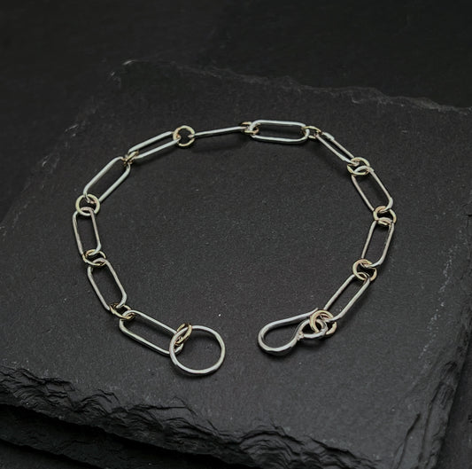 Forged sterling silver and 14k gold chain bracelet