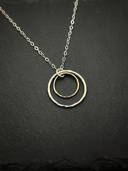 Forged sterling silver and 14 karat gold dainty double hoop necklace