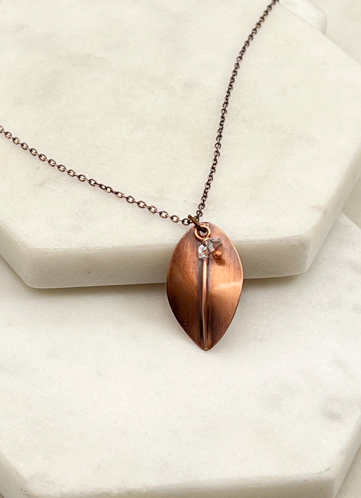 Hand forged copper leaf necklace with Herkimer Diamond