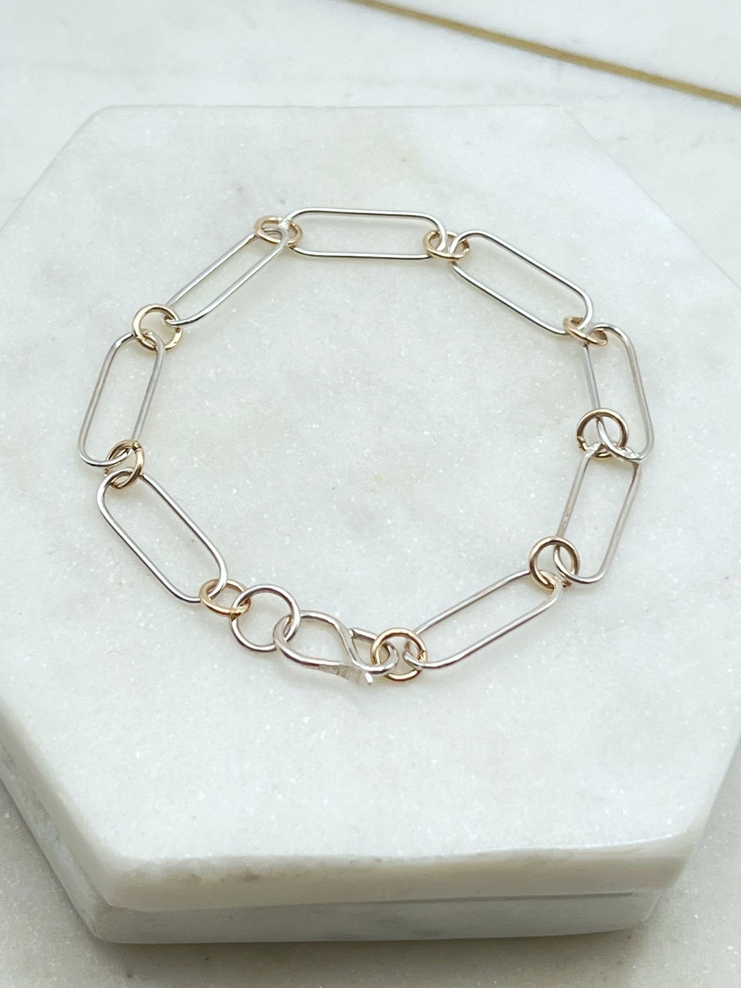 Forged sterling silver and 14k gold chain bracelet
