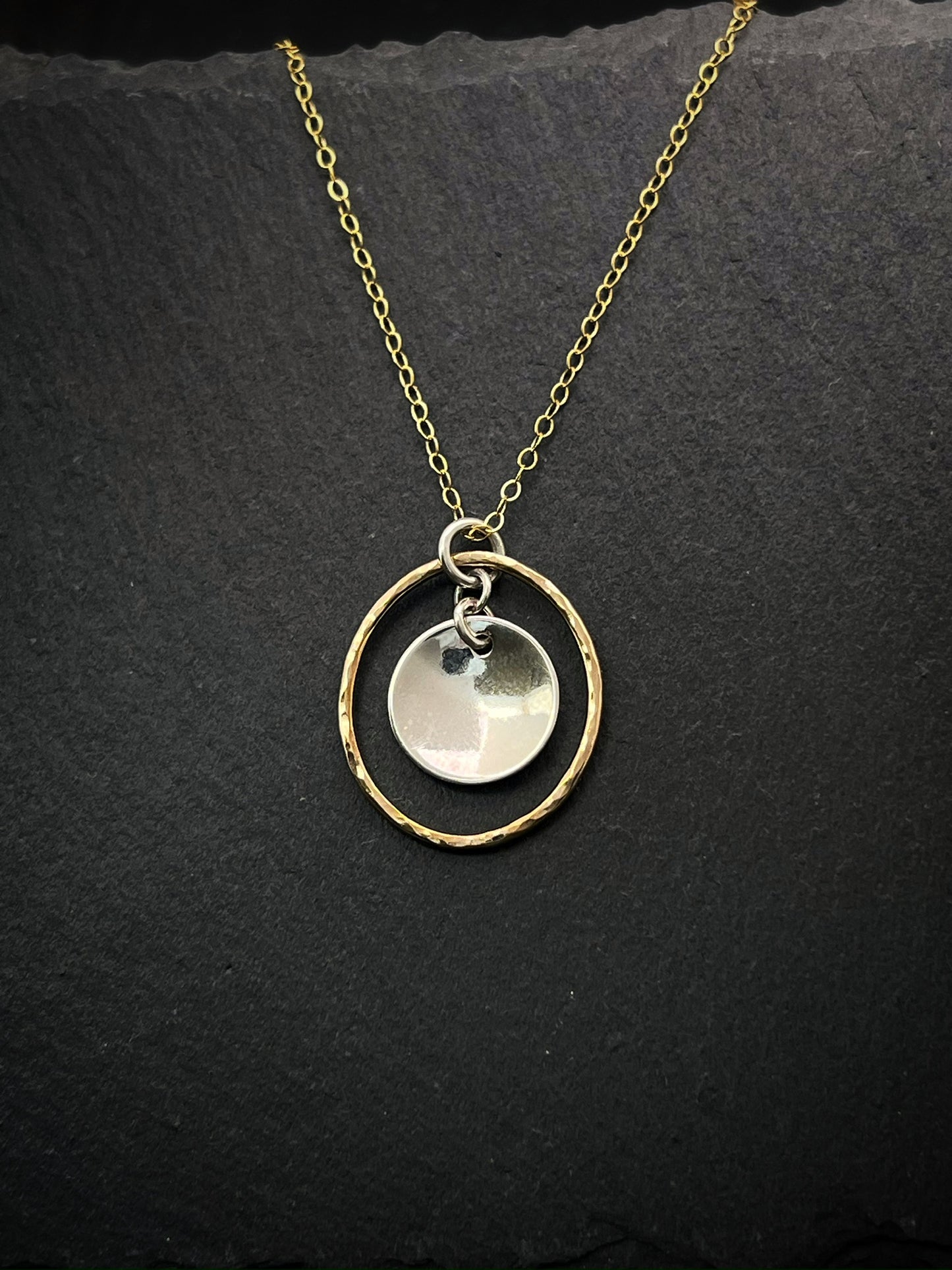 Forged sterling silver and 14 karat gold and sterling necklace