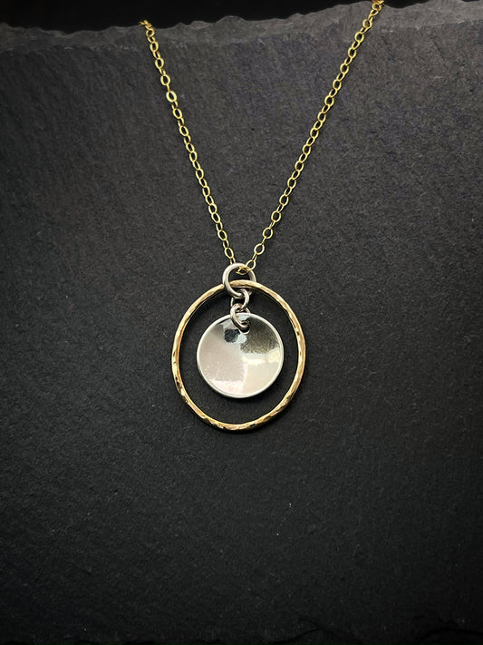 Forged sterling silver and 14 karat gold and sterling necklace