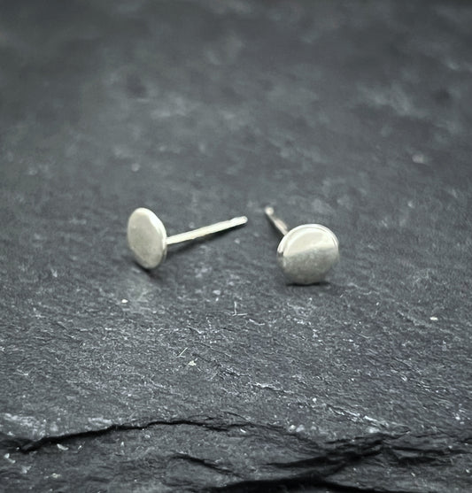 Tiny sterling silver textured stud earrings