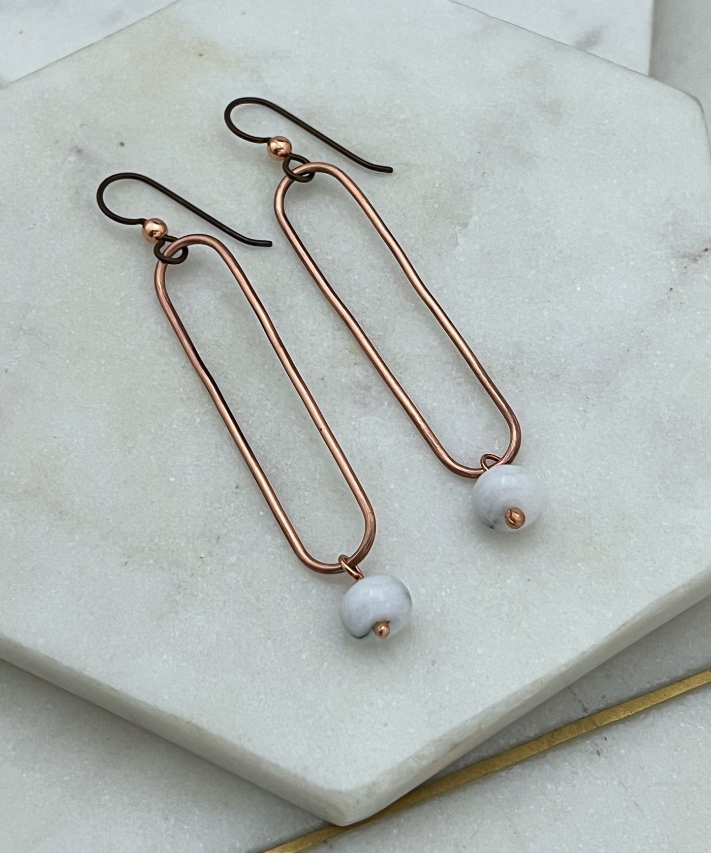 Copper oval hoops with snow quartz gemstones