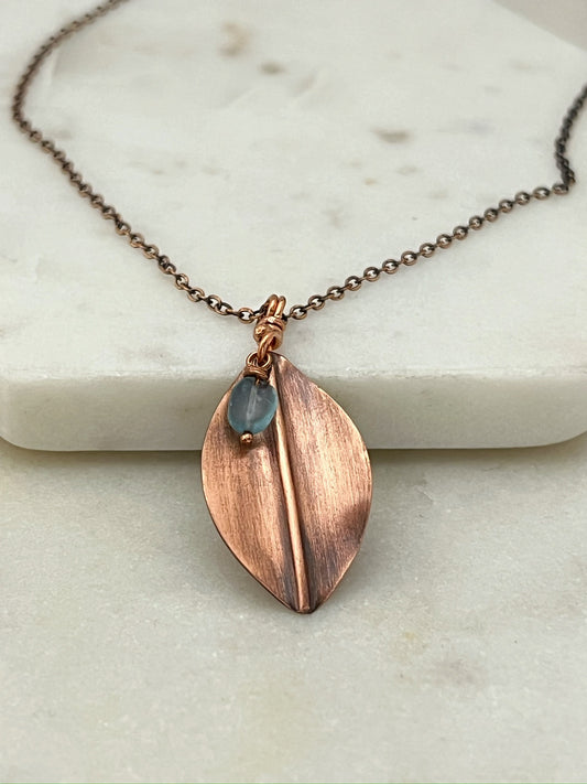 Hand forged copper leaf necklace with apatite gemstone