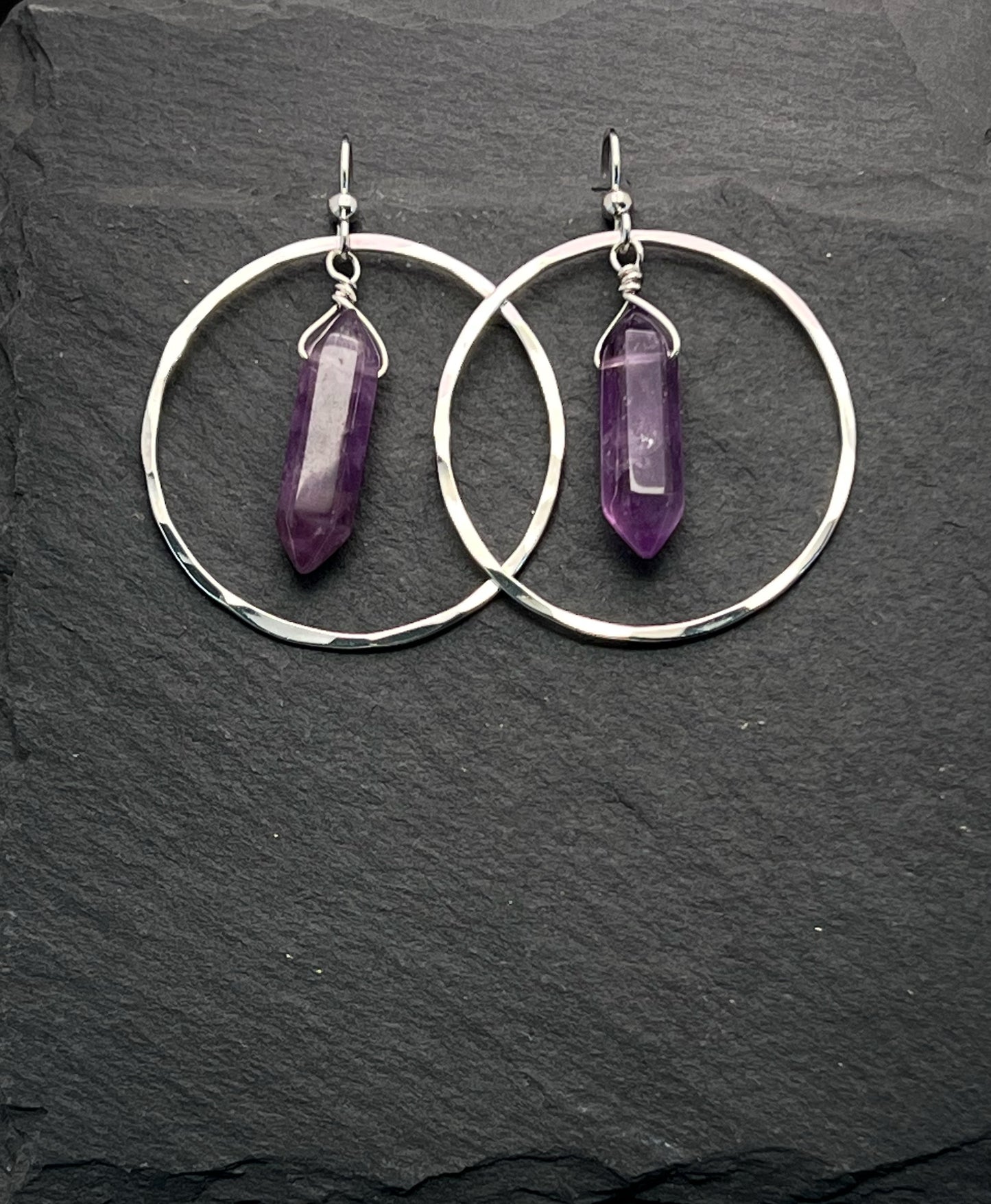 Sterling silver hoop earrings with amethyst gemstones