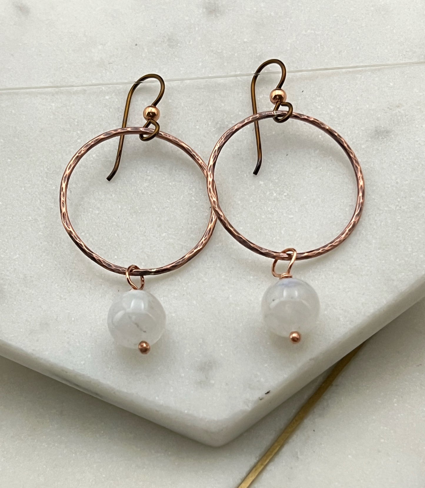 Copper hoops with rainbow moonstone gemstones