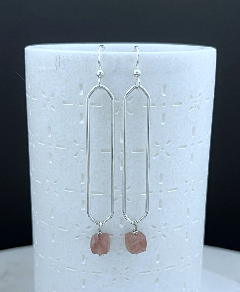 Sterling silver oval hoops with strawberry quartz
