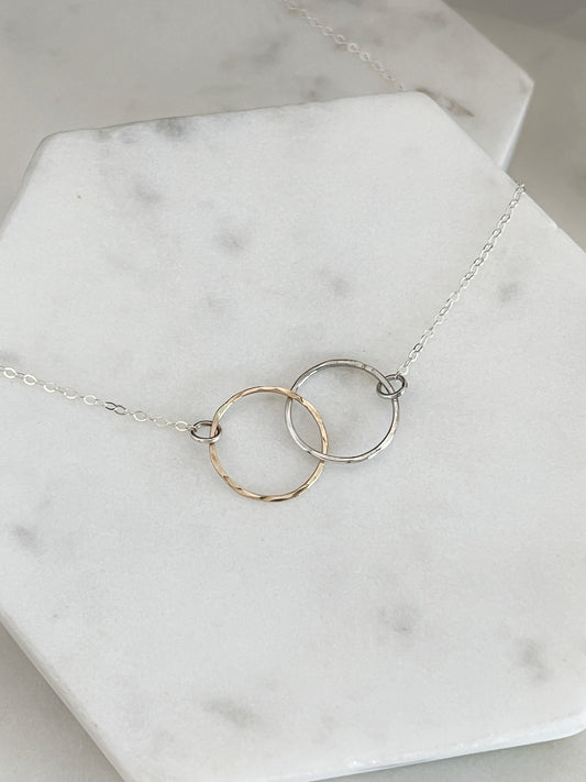 Sterling silver and gold-fill forged double hoop