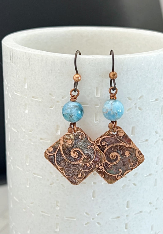 Acid etched copper earrings with apatite gemstones