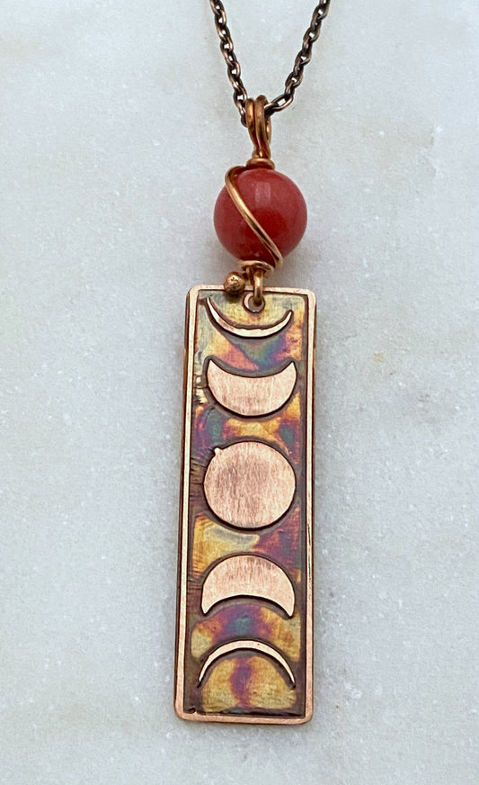 Moon phase acid etched copper necklace with coral gemstone