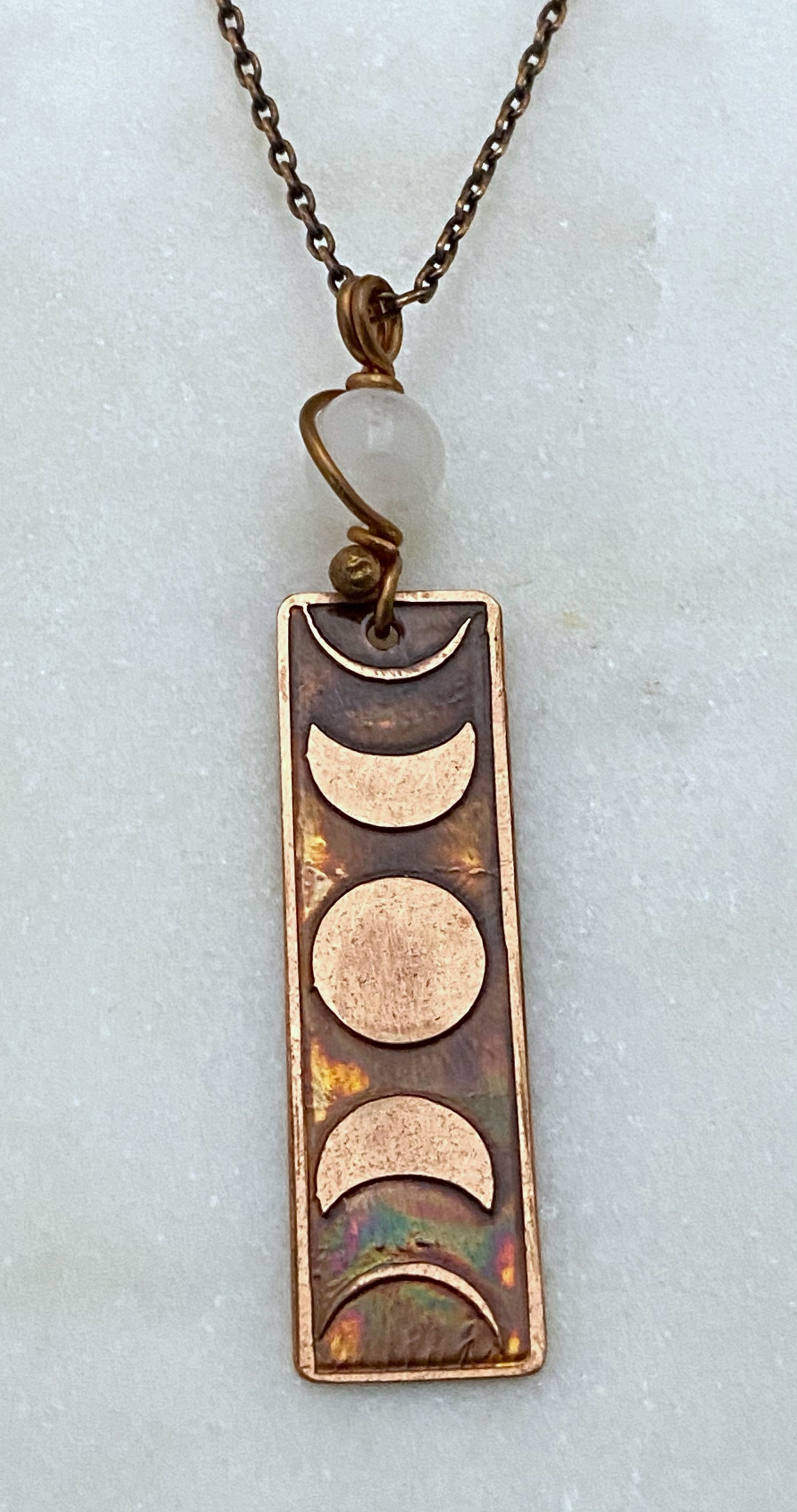 Moon phase acid etched copper necklace with moonstone gemstone