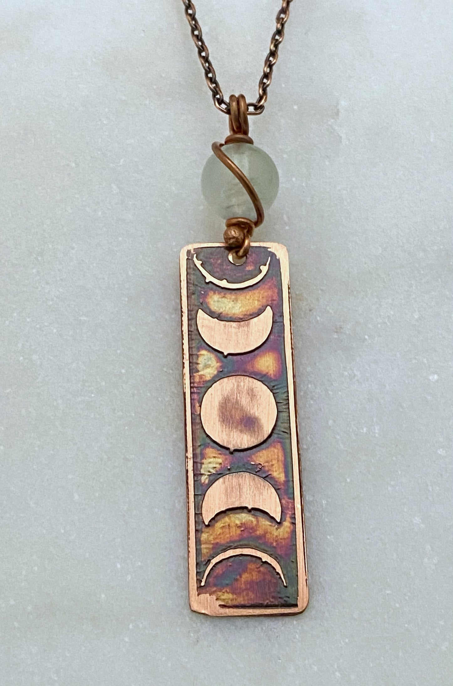 Moon phase acid etched copper necklace with prehnite gemstone