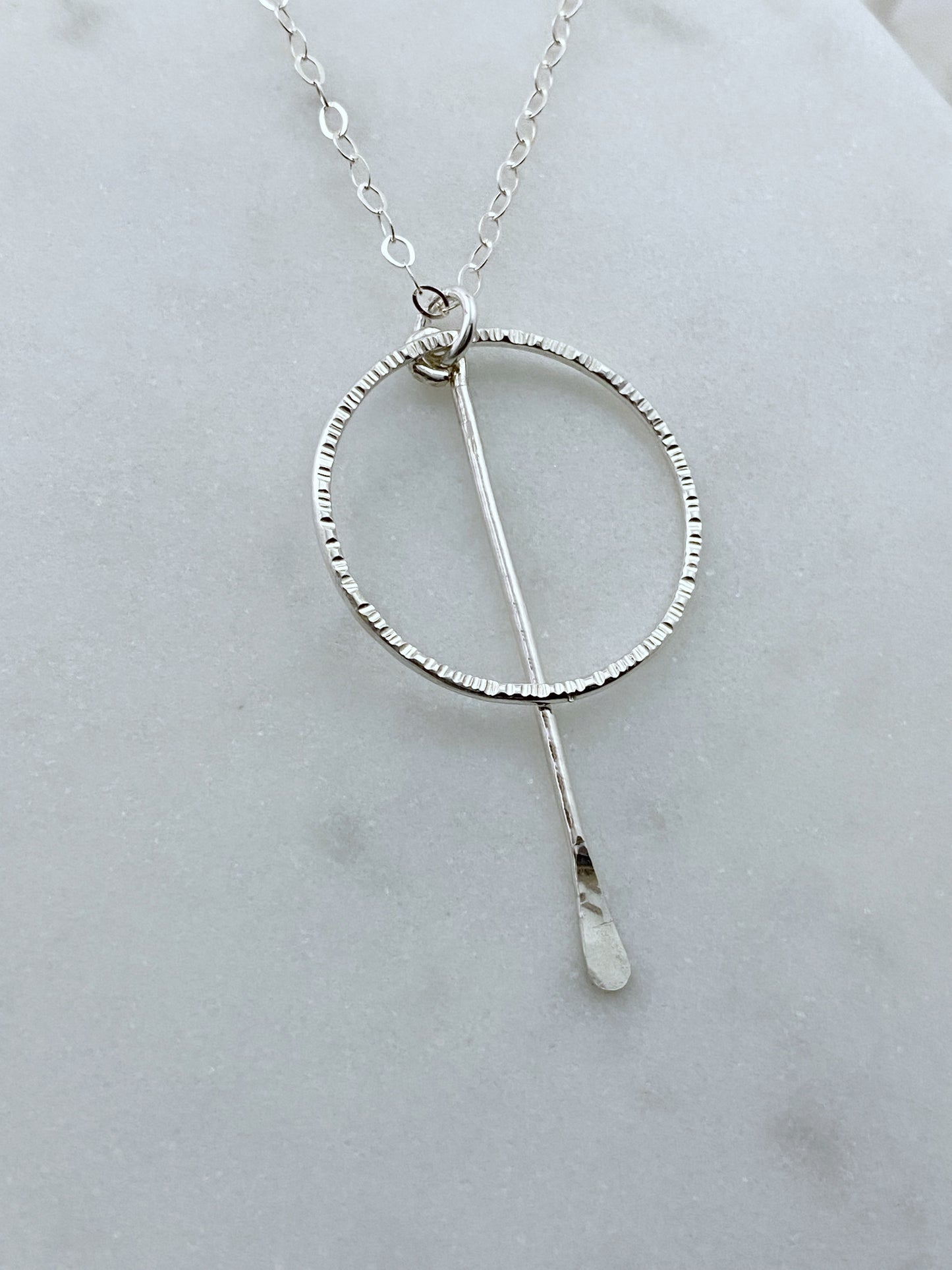 Sterling silver forged hoop necklace with sterling paddle