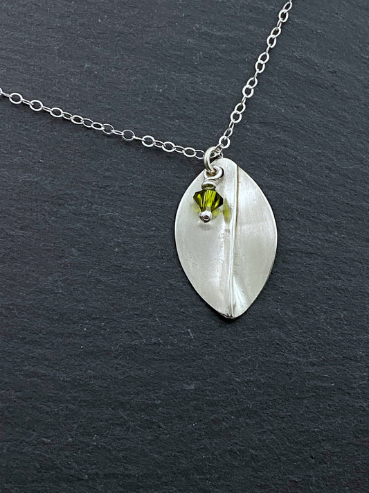 Forged sterling silver leaf necklace with olivine gemstone