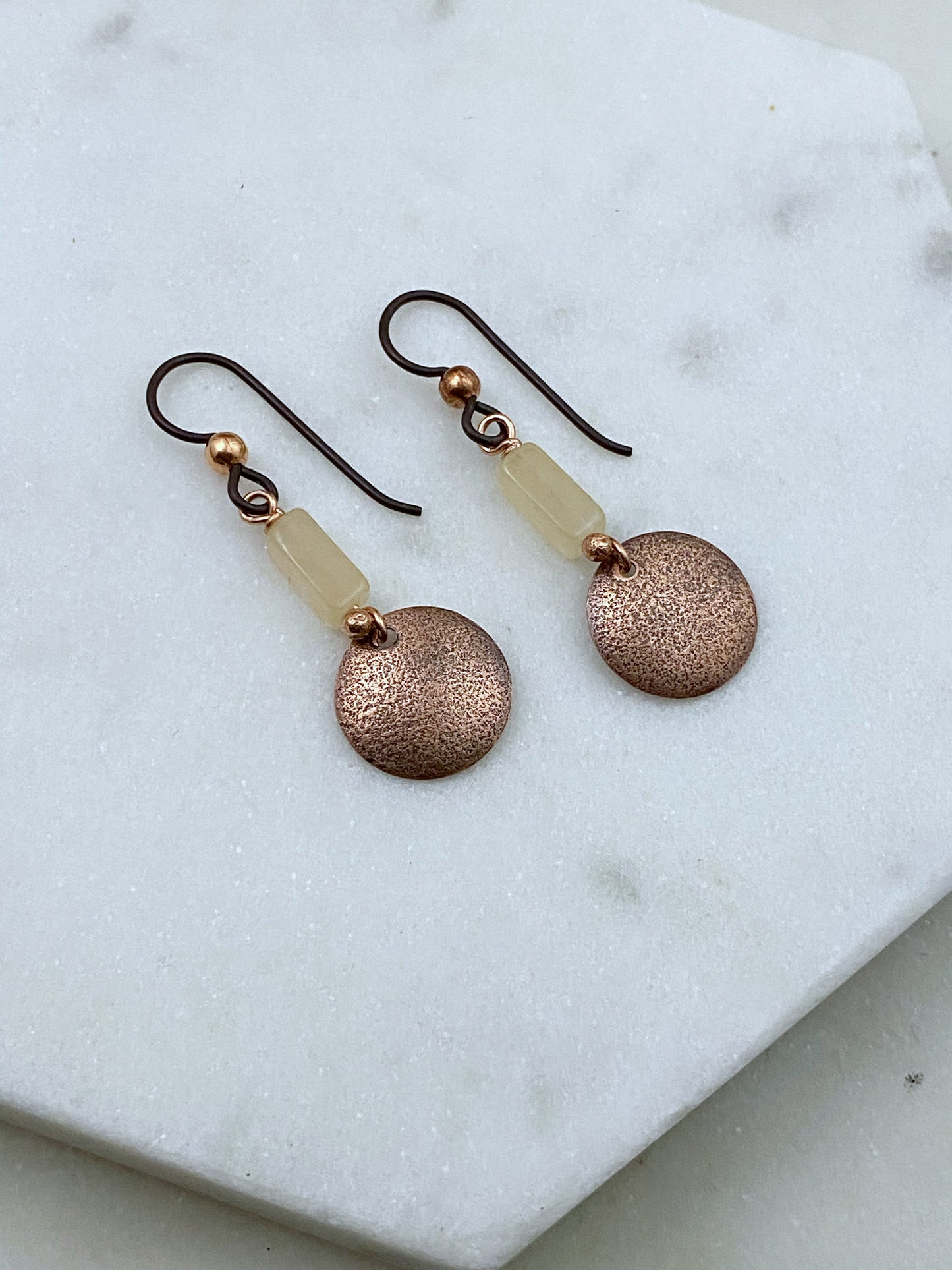 Forged copper earrings with quartz