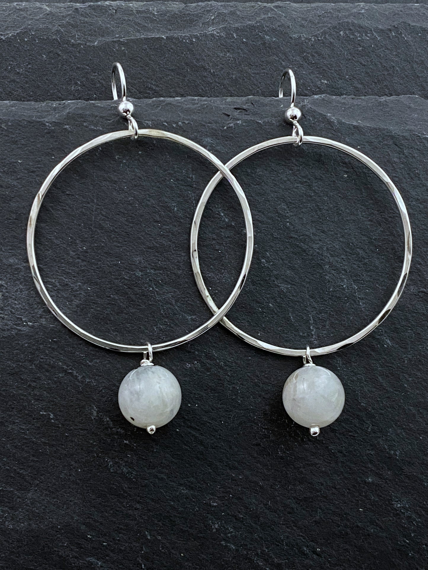Sterling silver forged hoop earrings with moonstone