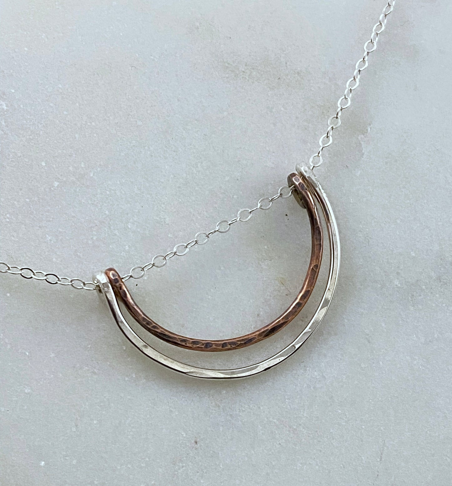 Forged sterling silver and copper wire half moon necklace