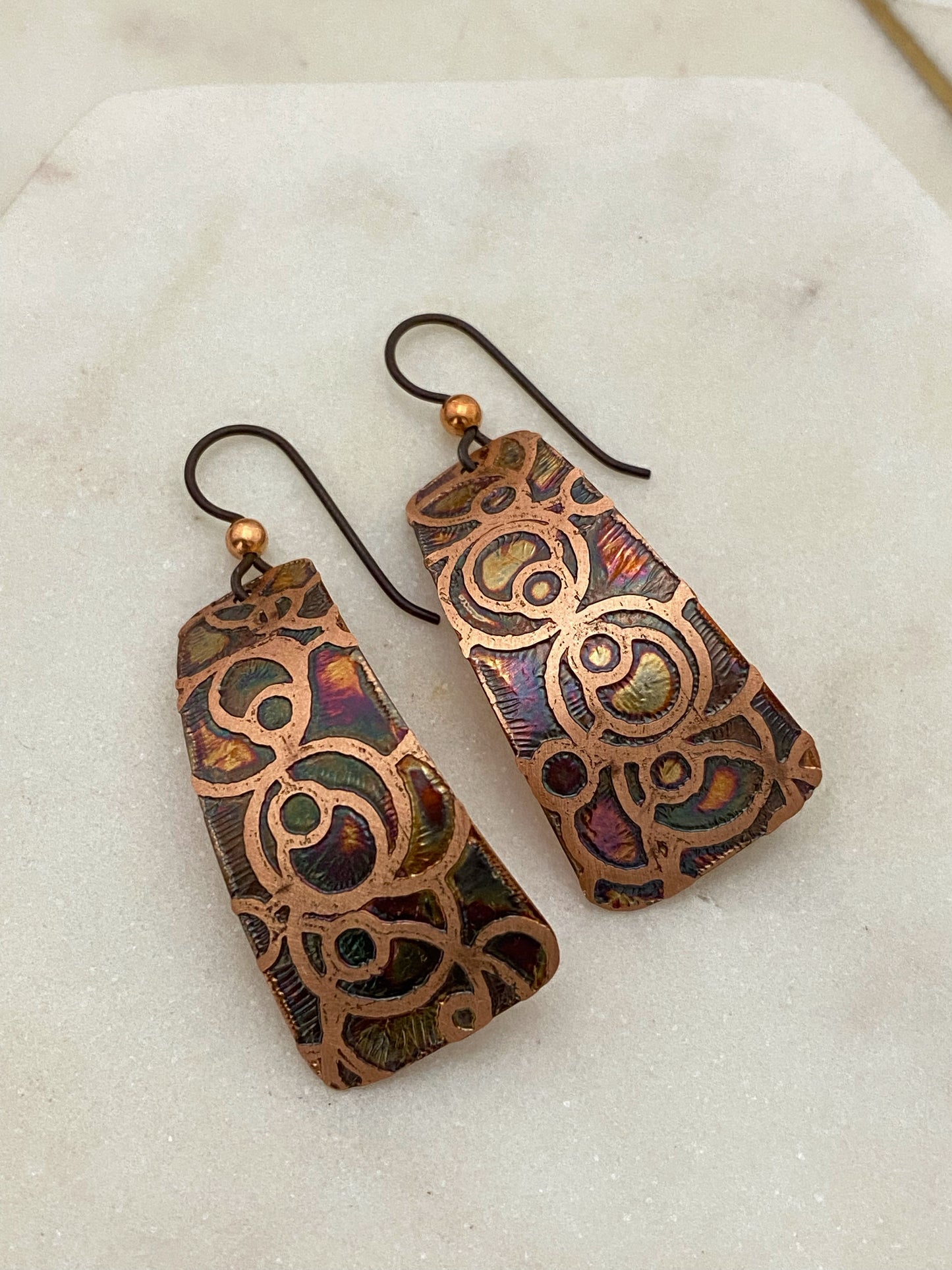 Acid etched copper irregular rectangle earrings.