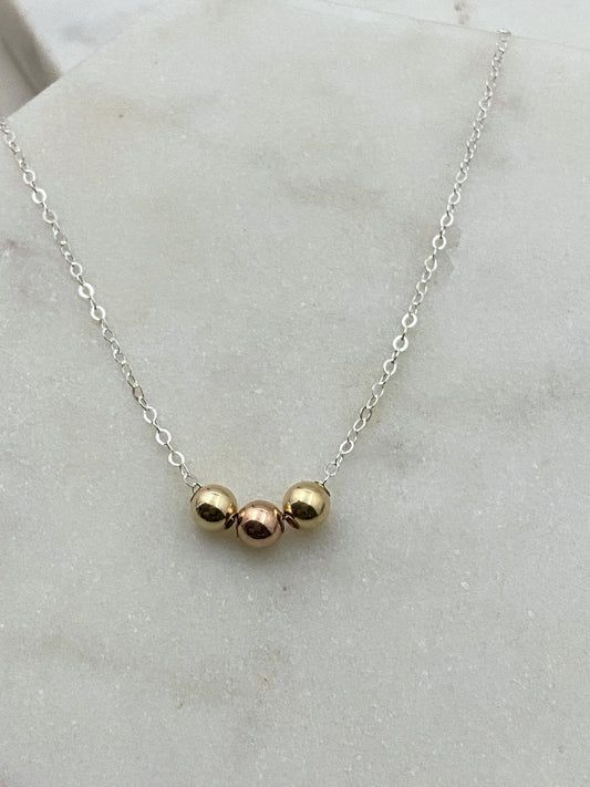 {Past, Present, Future} mixed metals necklace