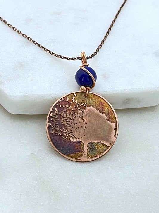 Acid etched copper blowing tree necklace with lapis gemstone