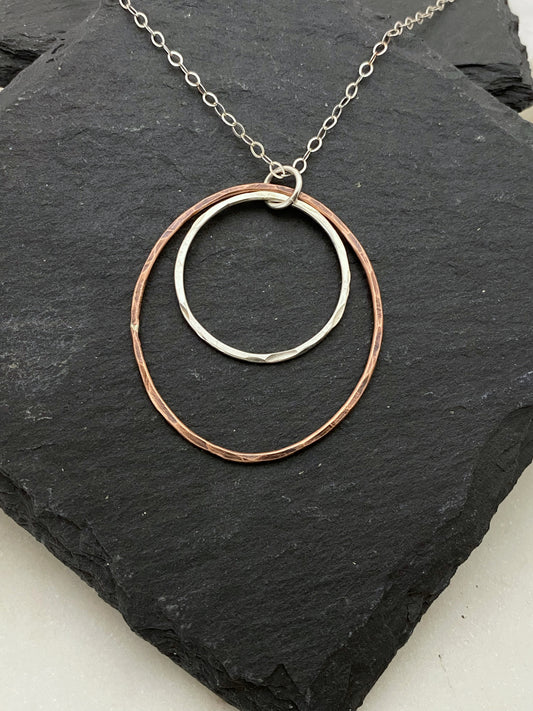 Sterling silver and copper forged hoop necklace