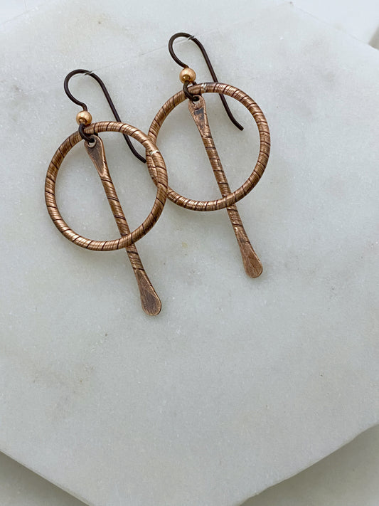 Forged Copper hoop earrings with paddle center