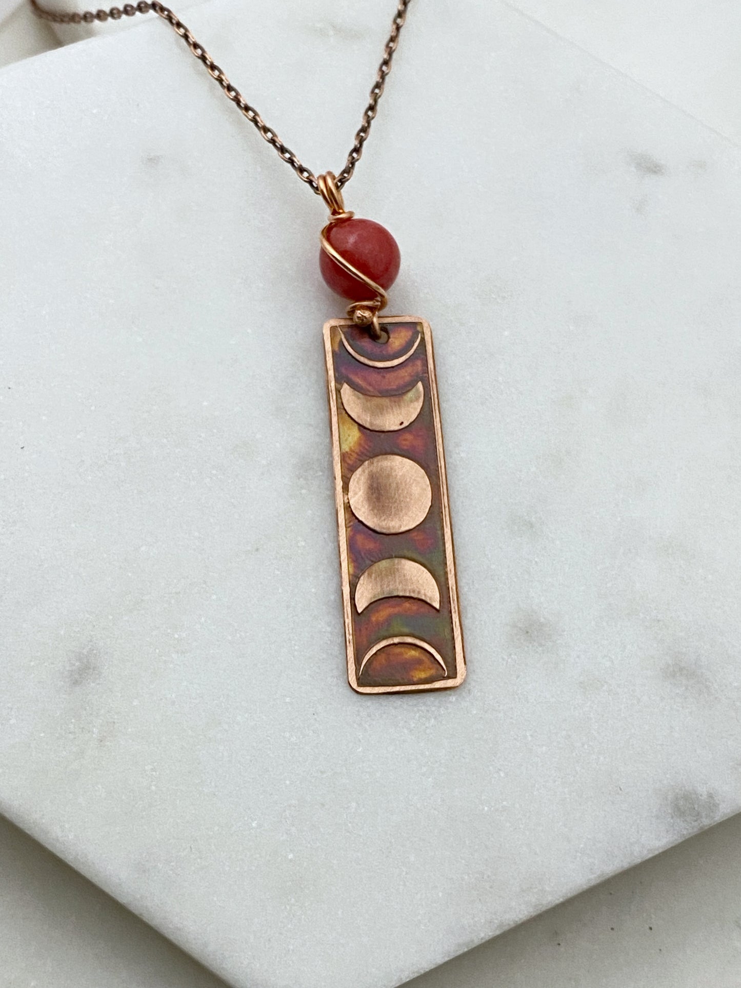 Moon phase acid etched copper necklace with coral gemstone