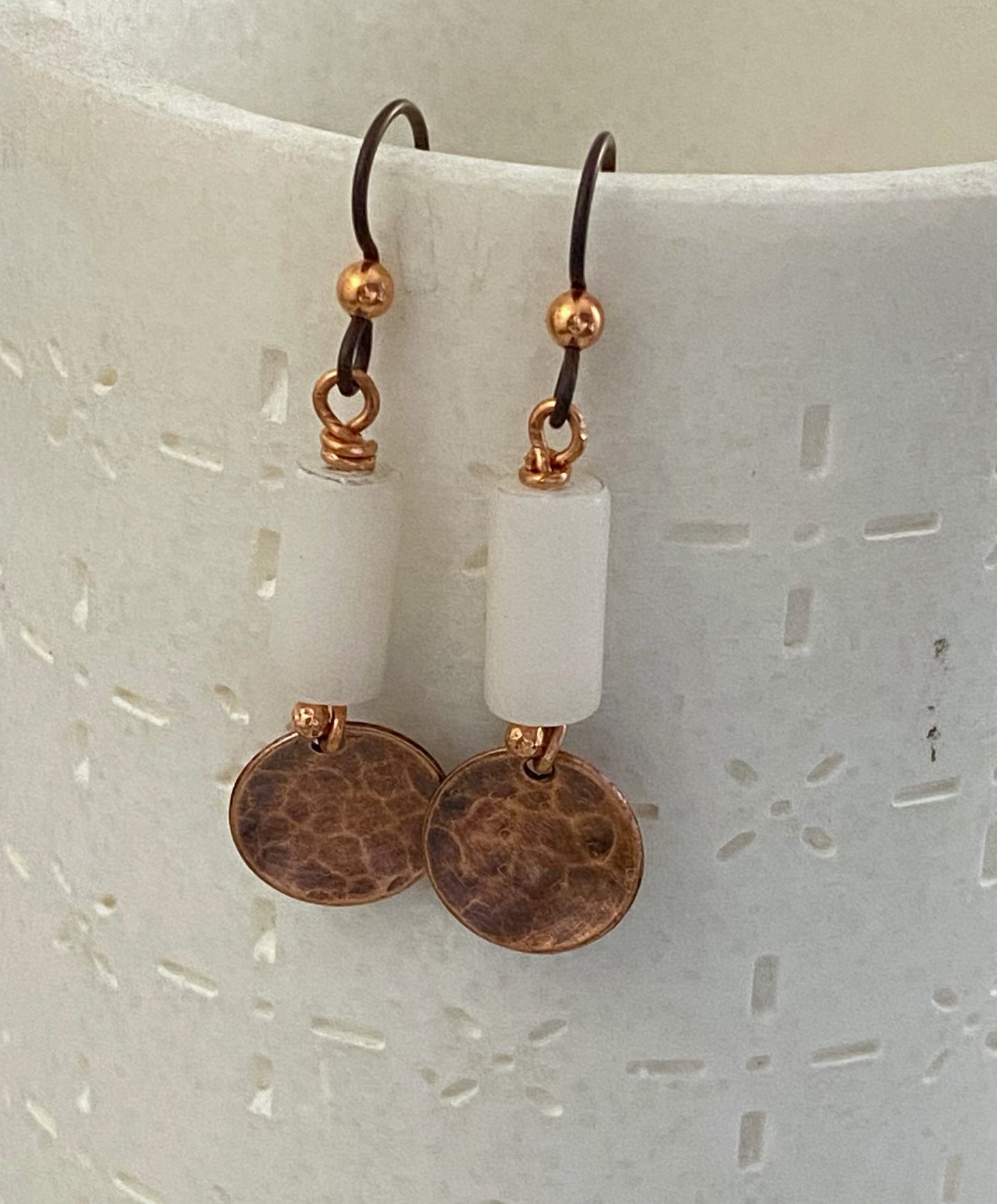 Forged copper earrings with calcite