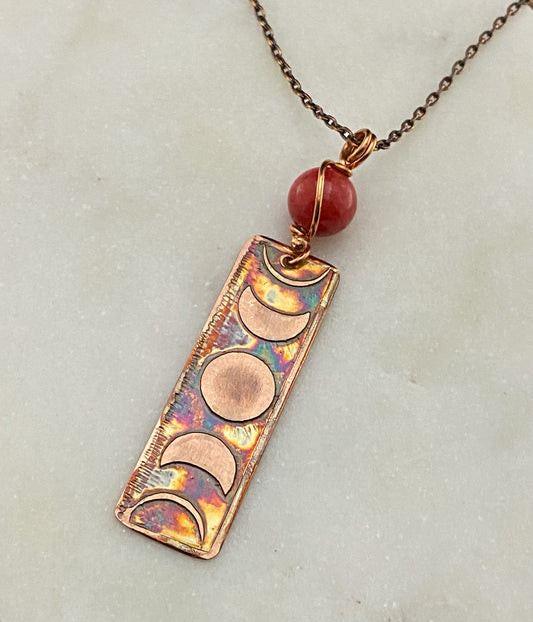 Moon phase acid etched copper necklace with coral gemstone