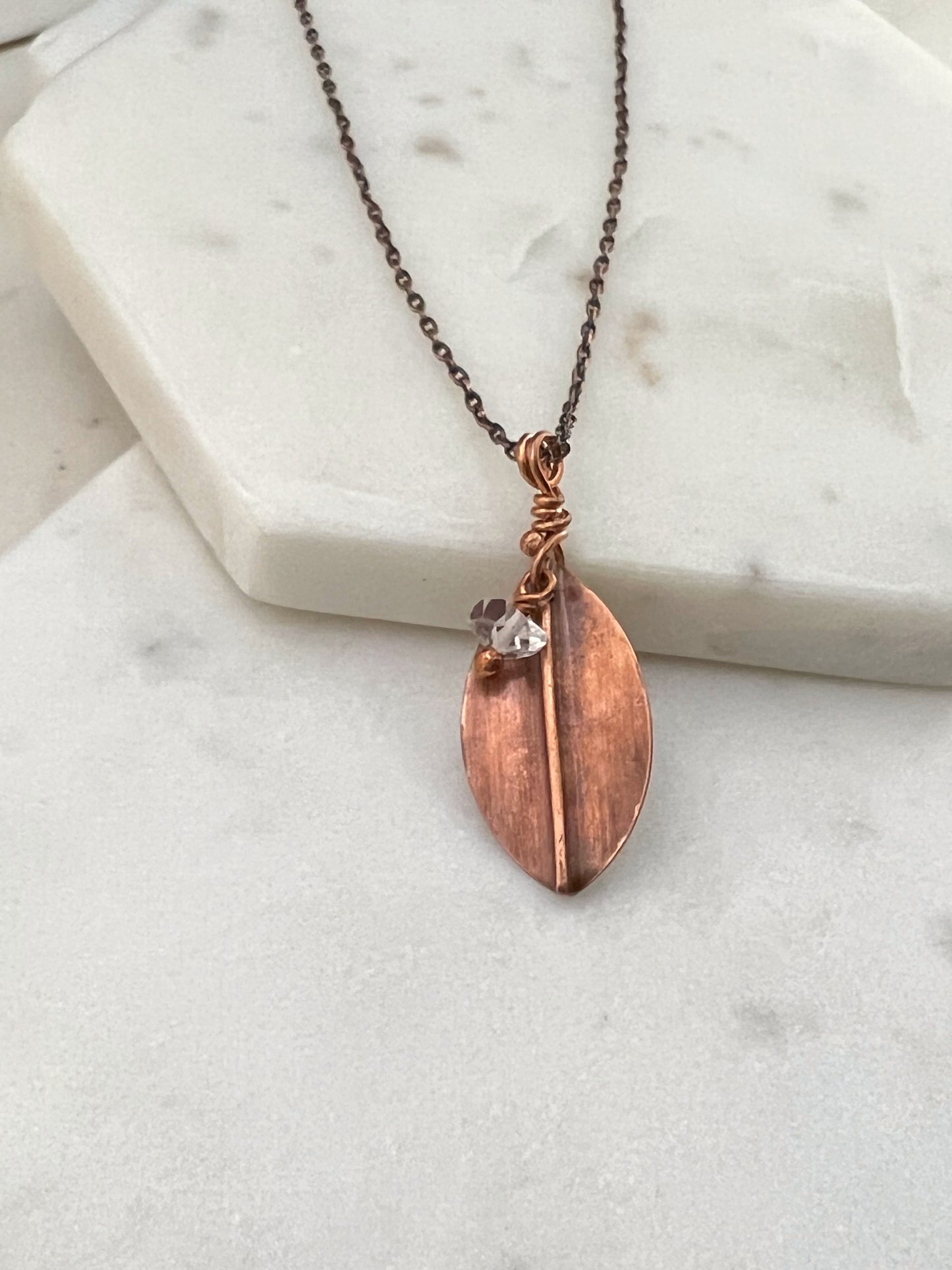 Forged copper leaf necklace with herkimer diamond
