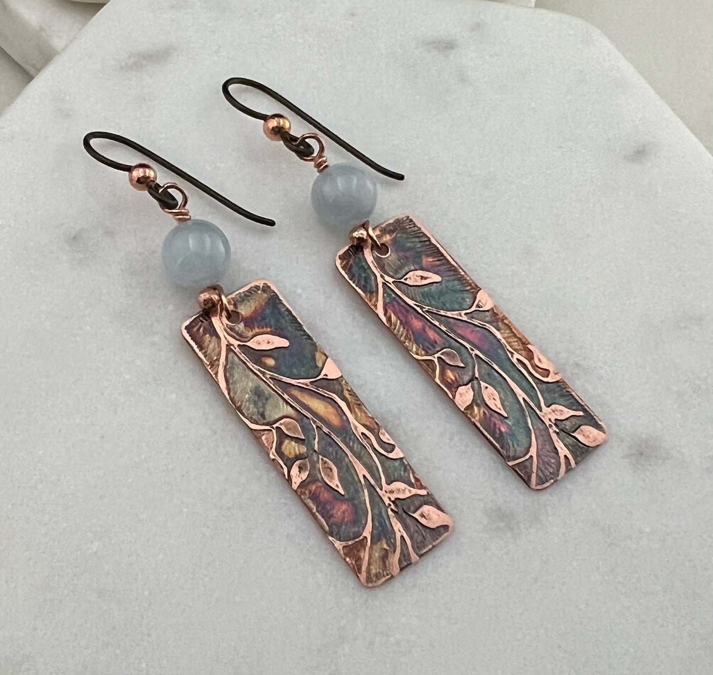 Acid etched copper earrings with aquamarine gemstones