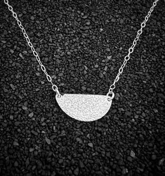 Sterling silver hammer textured half circle necklace