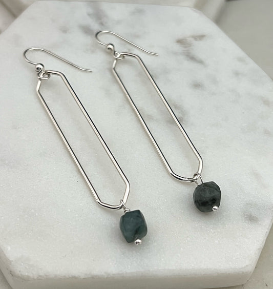Sterling silver hammer textured oval hoops with emerald