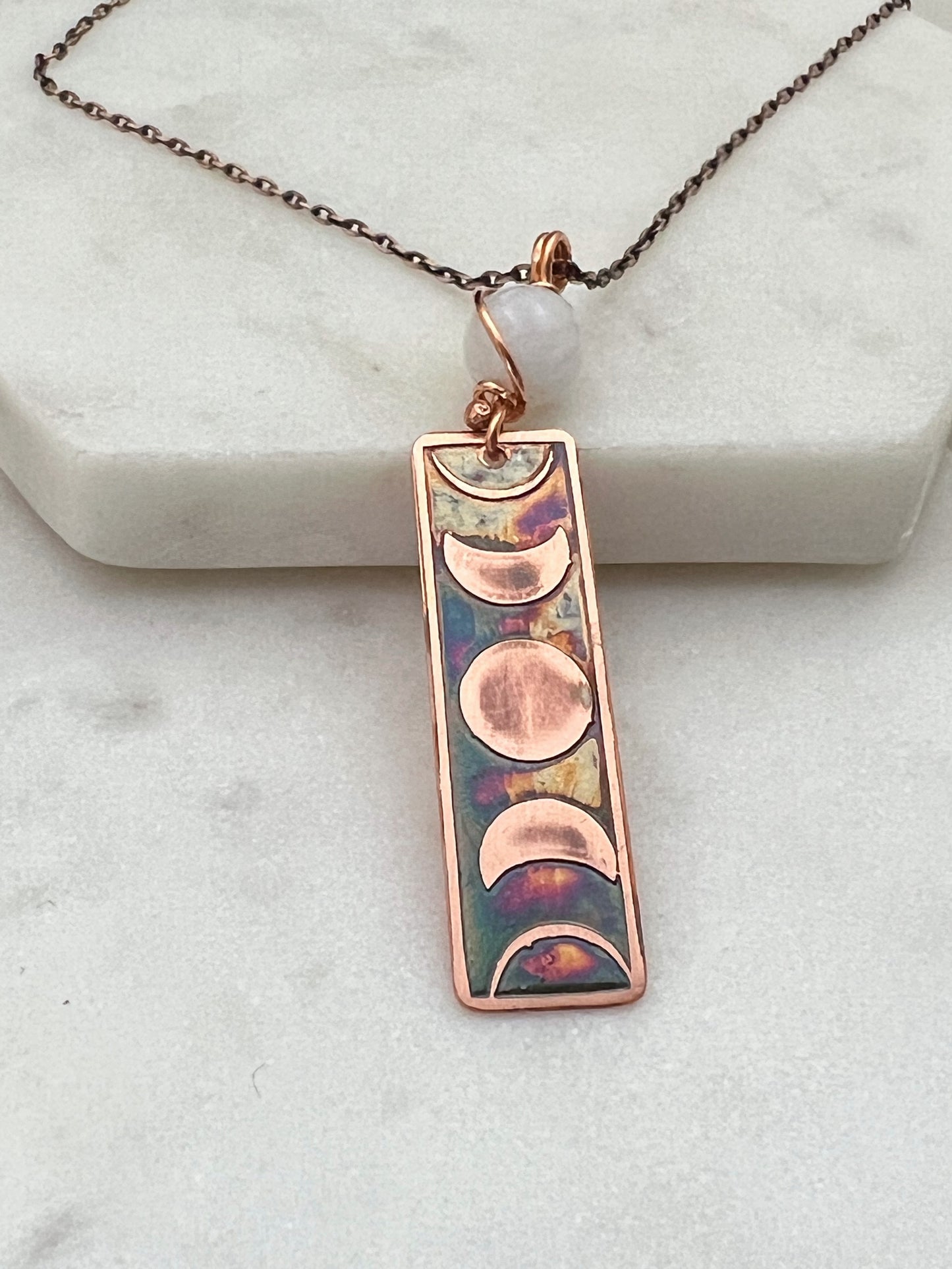 Moon phase acid etched copper necklace with moonstone gemstone